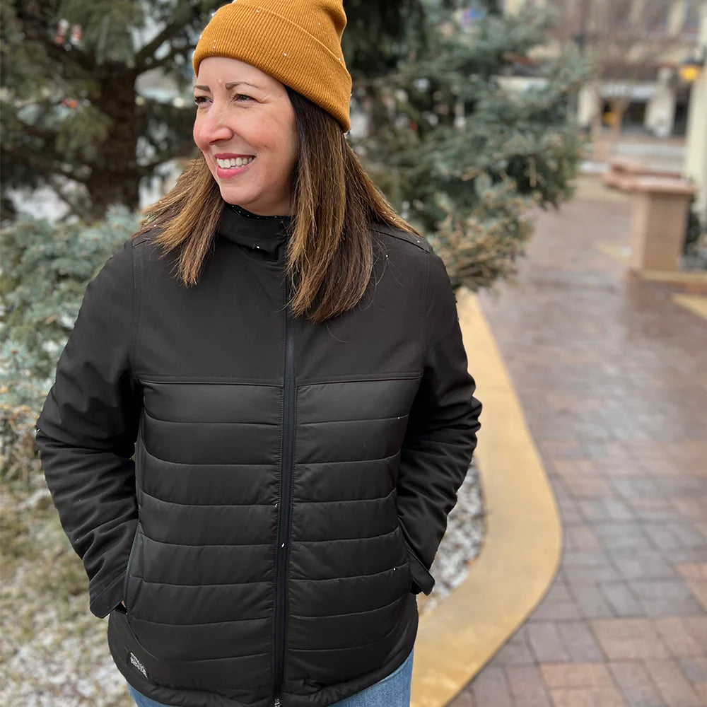 Dri Duck Women Modeling the Vista Puffer Jacket 9415 – Black