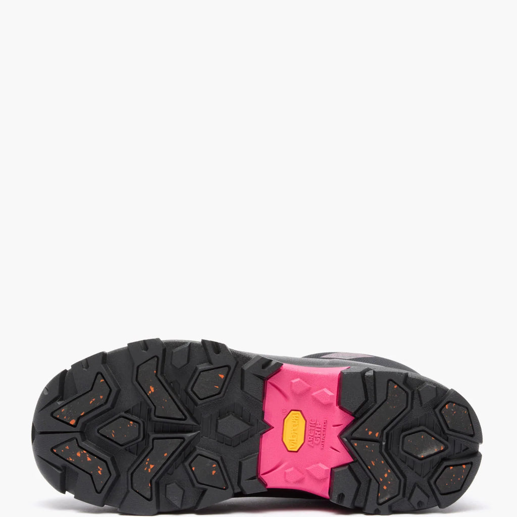 Vibram Arctic Grip A.T. outsole on Muck women's Arctic Ice Mid boot, showing black tread and pink midfoot
